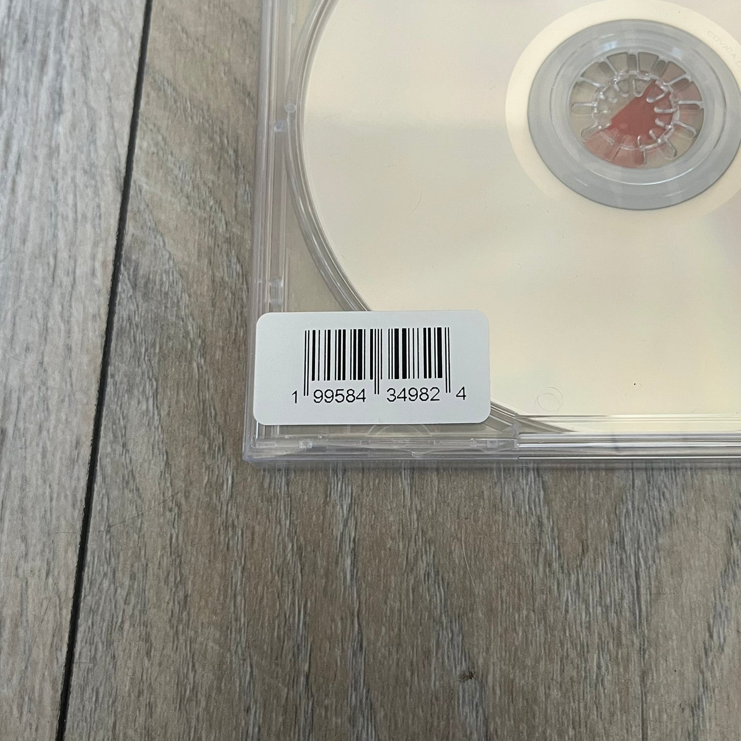 A$AP Rocky “Don’t Be Dumb” GRIM CD is a jewel case CD release of Don’t Be Dumb by A$AP Rocky featuring GRIM artwork by Tim Burton. The cover includes large “Don’t Be Dumb” text with smaller “A$AP Rocky” and “Tim Burton Presents” above, along with the GRIM figure holding a megaphone. The case spine features “Don’t Be Dumb” text, and the disc includes a foil design with a red crossed-out circle graphic.