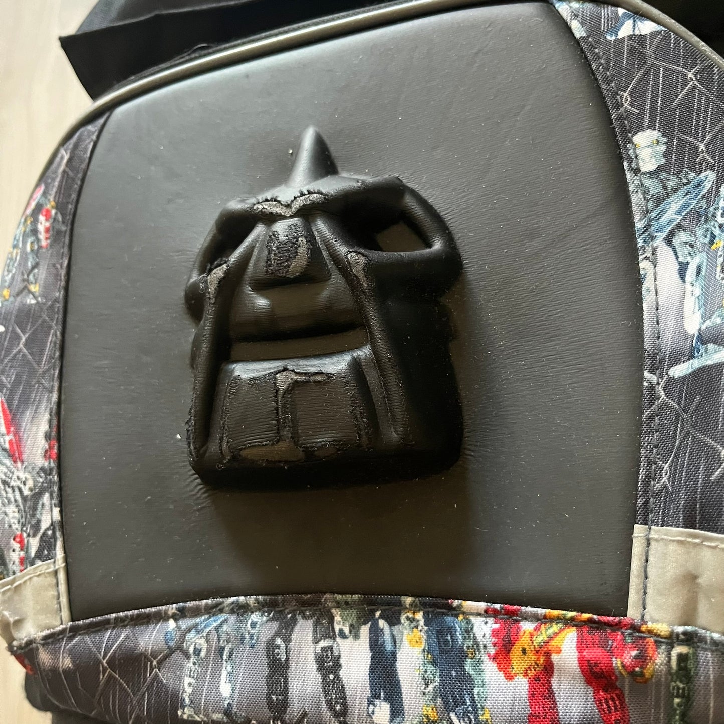 Rare 2007 Bionicle Inika "Toa Nuparu" school backpack made by Grown Up Licenses Limited under The Lego Group. Features a 3D molded Toa Nuparu head on the lower front pocket and a fully printed velcro top compartment with Bionicle figures. Spacious, durable, and reinforced for structure. A standout collectible for any true Bionicle fan.