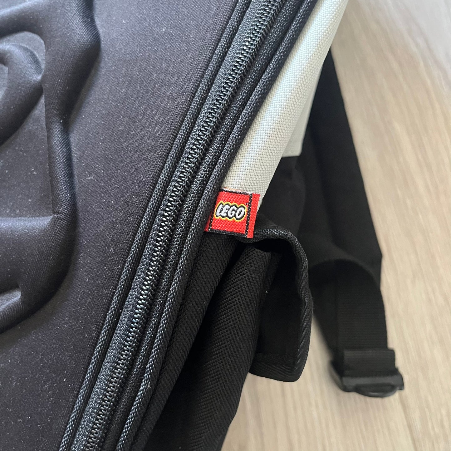 Extremely rare 2003 Bionicle Tahu Nuva backpack, produced by Kabooki for the Lego Cargo System line. The front features a large 3D molded face of Tahu Nuva, topped with a big Bionicle logo and his name underneath. Designed with one spacious main compartment and two smaller side pockets secured by velcro straps. Backpack was basically never seen online before.