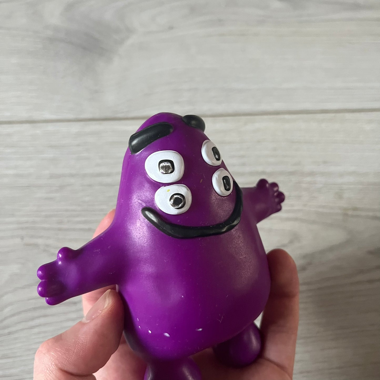 Official CPFM x McDonald’s Grimace collectible from the FW22 drop. The purple figure showcases the McDonald’s icon reimagined with CPFM’s four-eye design. Released October 3rd, 2022, as part of the limited adult Happy Meal collection, licensed on the back.