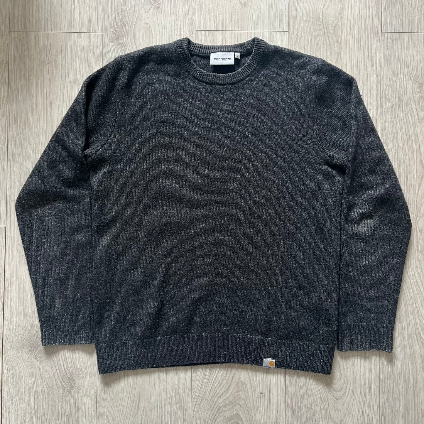 The Carhartt WIP Allen Sweater blends function and refinement in a dark gray wool–nylon knit. Midweight with ribbed details at the neck, cuffs, and hem, it ensures warmth and flexibility. A classic, durable knit that captures the minimal craftsmanship of Carhartt WIP.