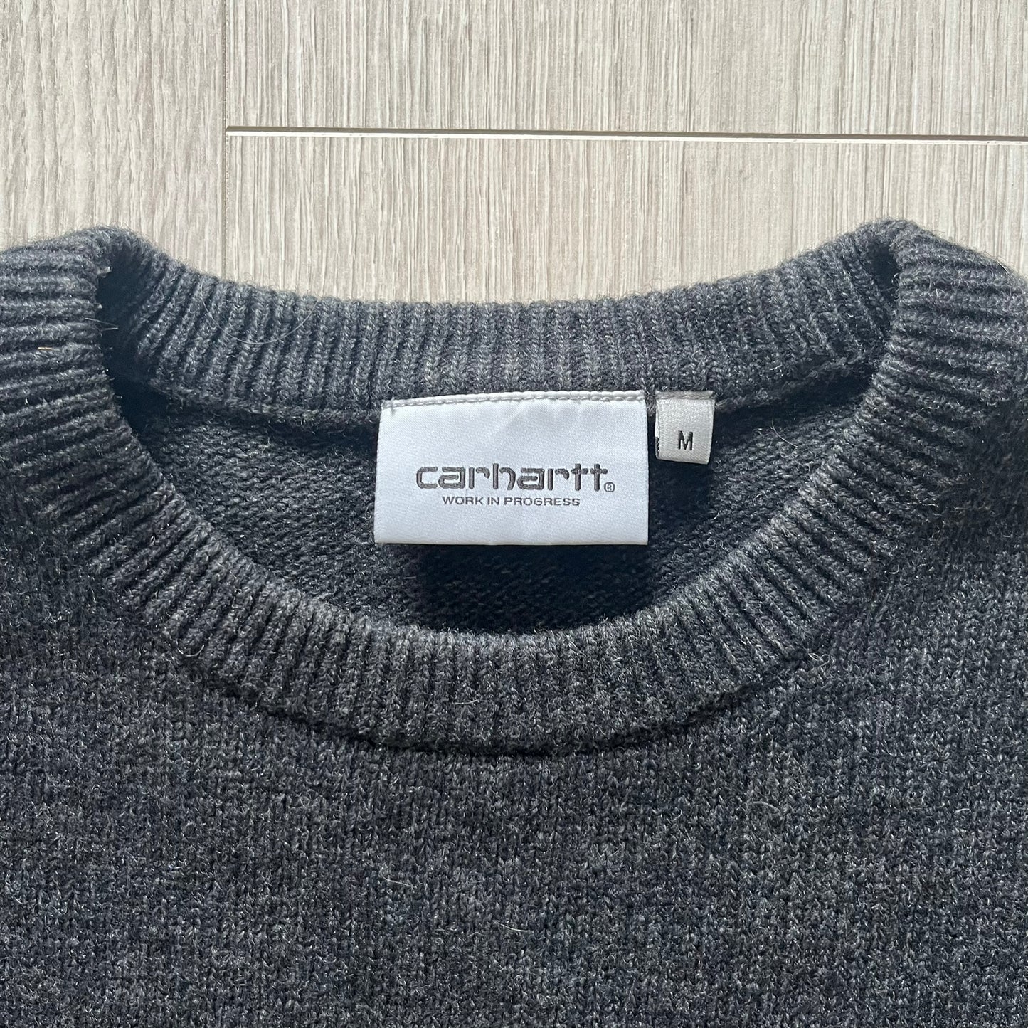 The Carhartt WIP Allen Sweater blends function and refinement in a dark gray wool–nylon knit. Midweight with ribbed details at the neck, cuffs, and hem, it ensures warmth and flexibility. A classic, durable knit that captures the minimal craftsmanship of Carhartt WIP.