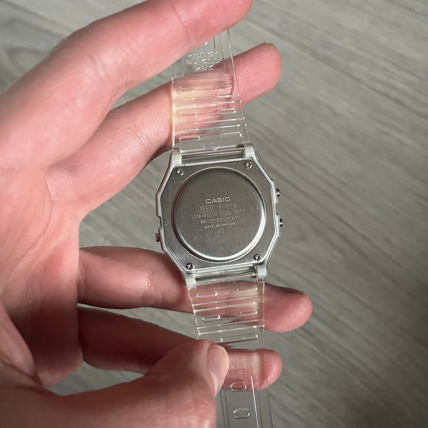 Custom Casio F-91W Clear/Transparent digital watch featuring a Awesome Face filter screen. Slim 8.5 mm profile, lightweight 21 g build and flexible bio-based resin band ensure lasting comfort. Includes alarm, stopwatch, and microlight function for everyday functionality.