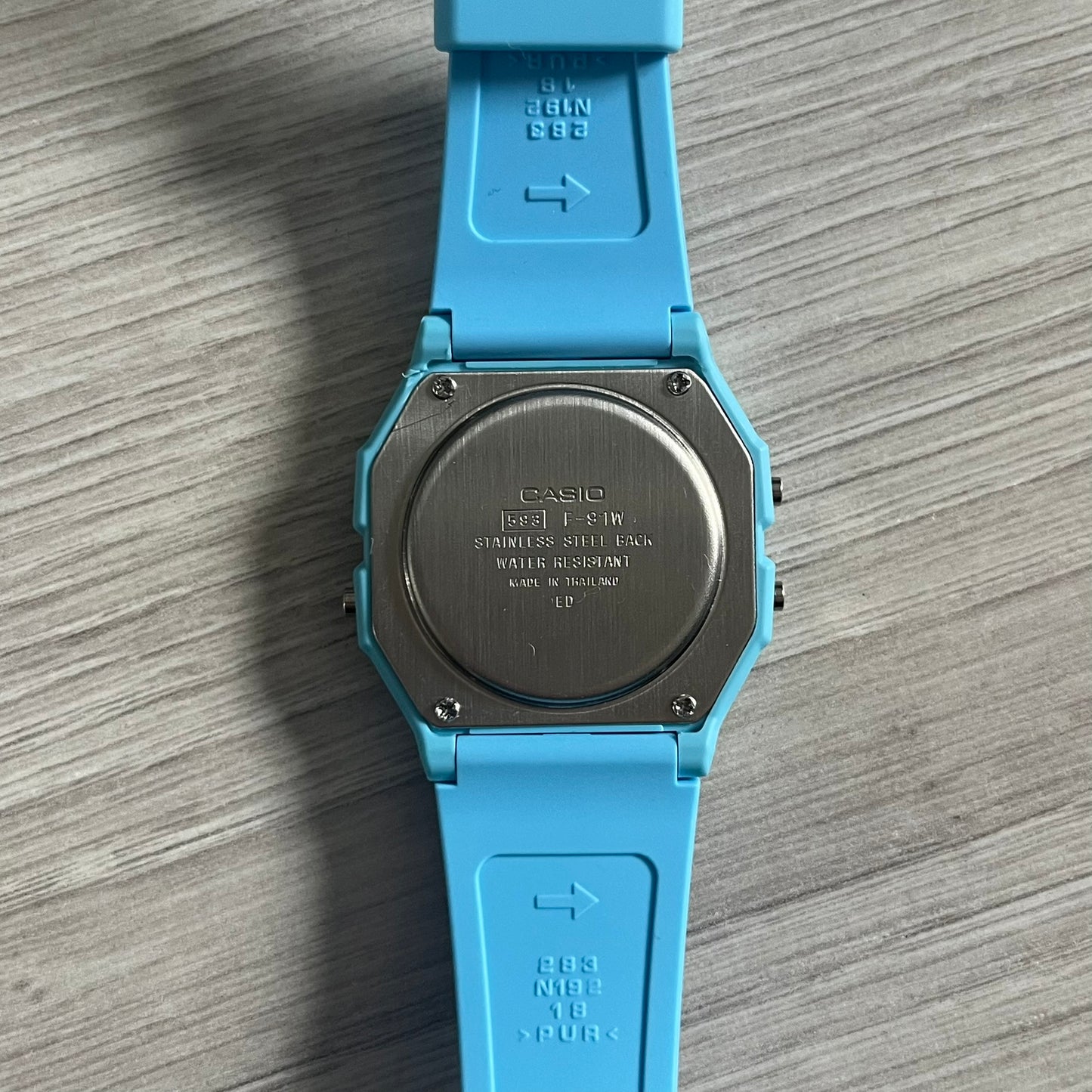 Custom Casio F-91W Baby Blue digital watch featuring a Gradient Blue filter screen. Slim 8.5 mm profile, lightweight 21 g build and flexible bio-based resin band ensure lasting comfort. Includes alarm, stopwatch, and microlight function for everyday functionality.
