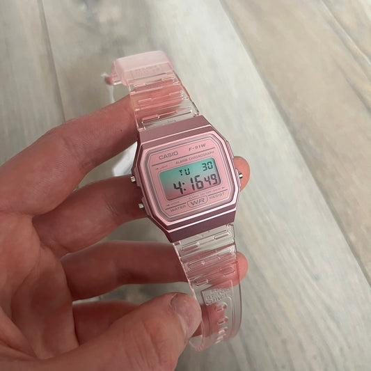 Custom Casio F-91W Pink digital watch featuring a gradient mint and pink filter screen. Slim 8.5 mm profile, lightweight 21 g build and flexible bio-based resin band ensure lasting comfort. Includes alarm, stopwatch, and microlight function for everyday functionality.