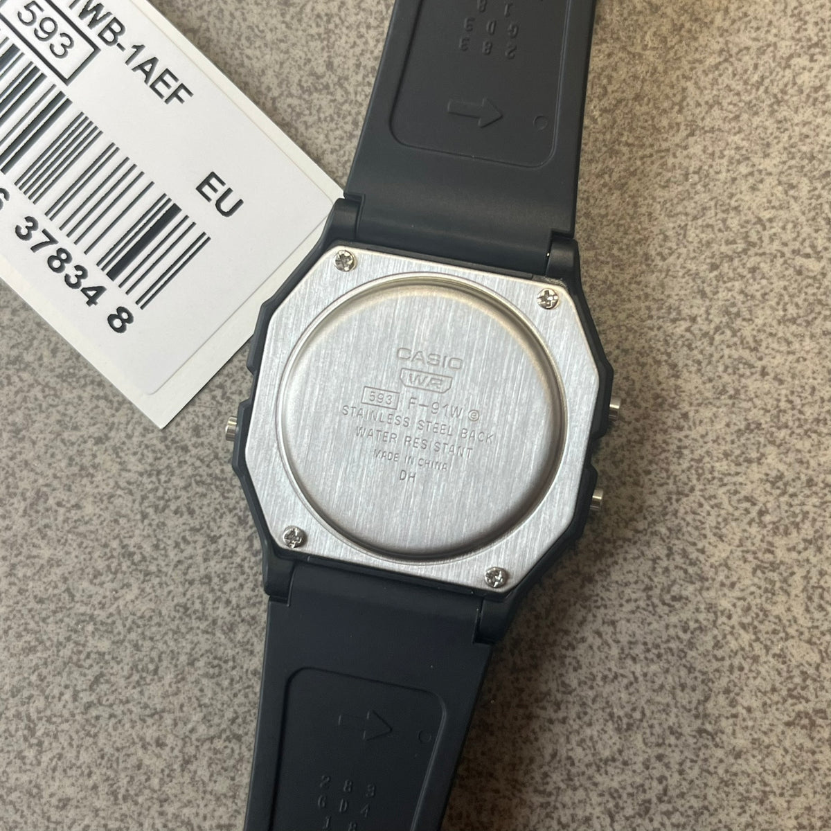 Custom Casio F-91W Black digital watch featuring a Anime green eyes filter screen. Slim 8.5 mm profile, lightweight 21 g build and flexible bio-based resin band ensure lasting comfort. Includes alarm, stopwatch, and microlight function for everyday functionality.
