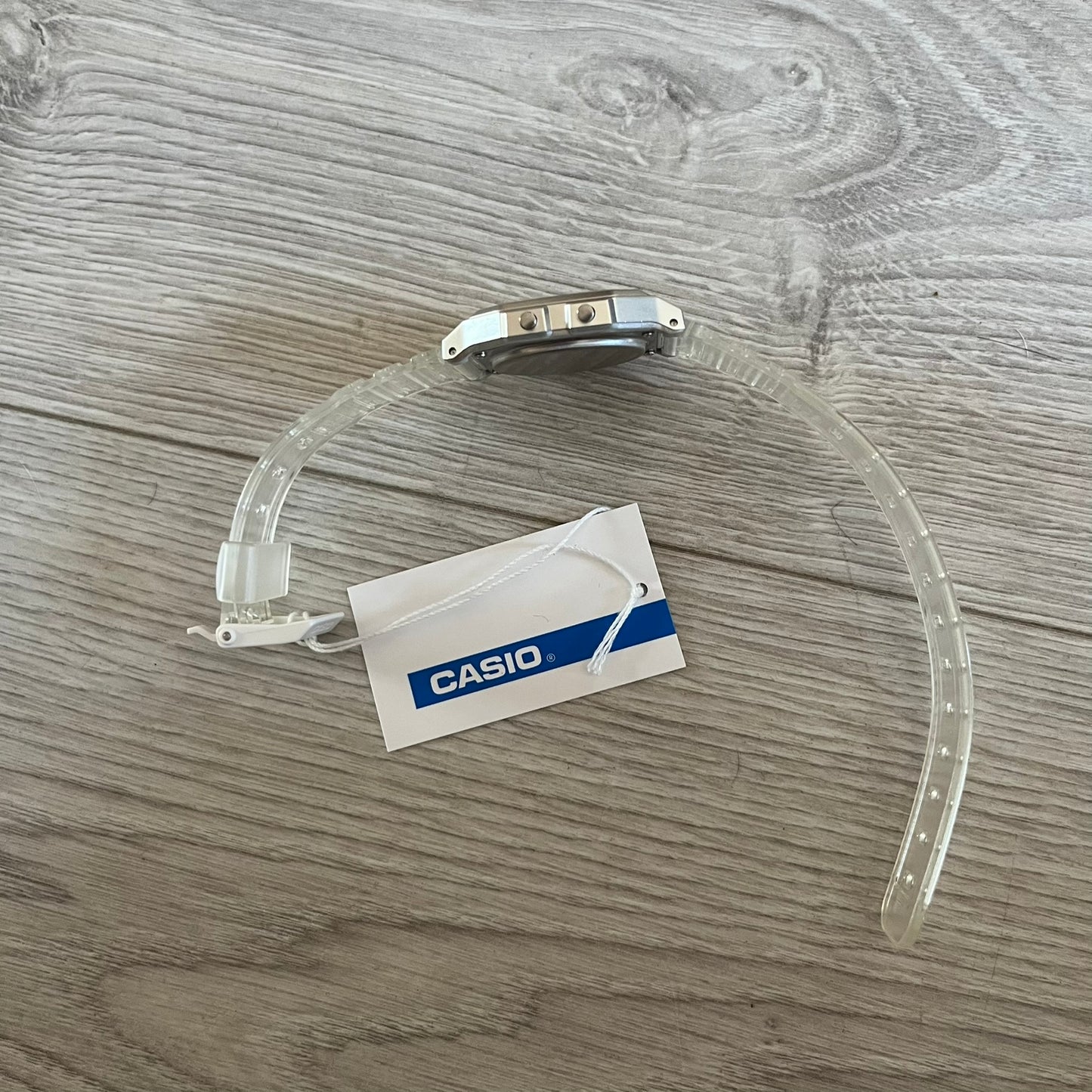 Custom Casio F-91W Clear/Transparent digital watch featuring a Poker table graphic filter screen. Slim 8.5 mm profile, lightweight 21 g build and flexible bio-based resin band ensure lasting comfort. Includes alarm, stopwatch, and microlight function for everyday functionality.