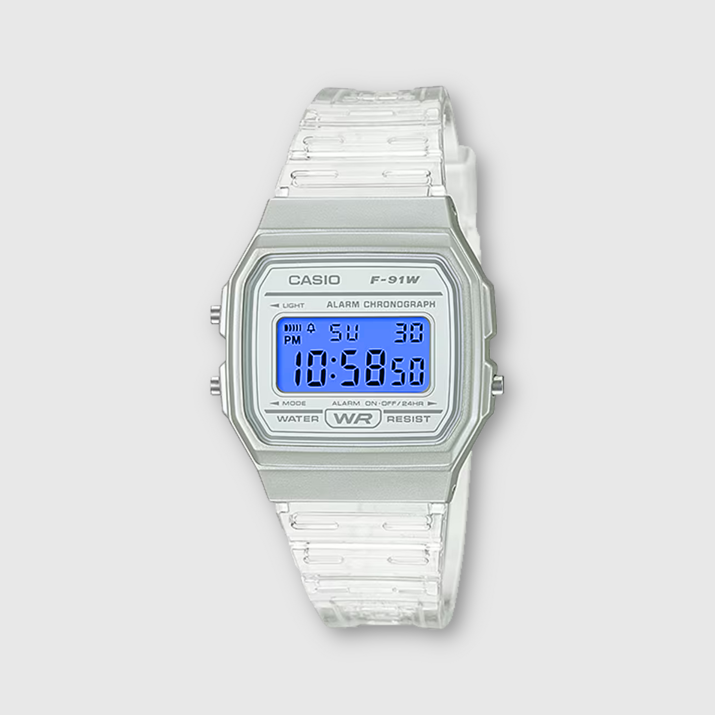 Casio digital watch with clear strap on a light gray background