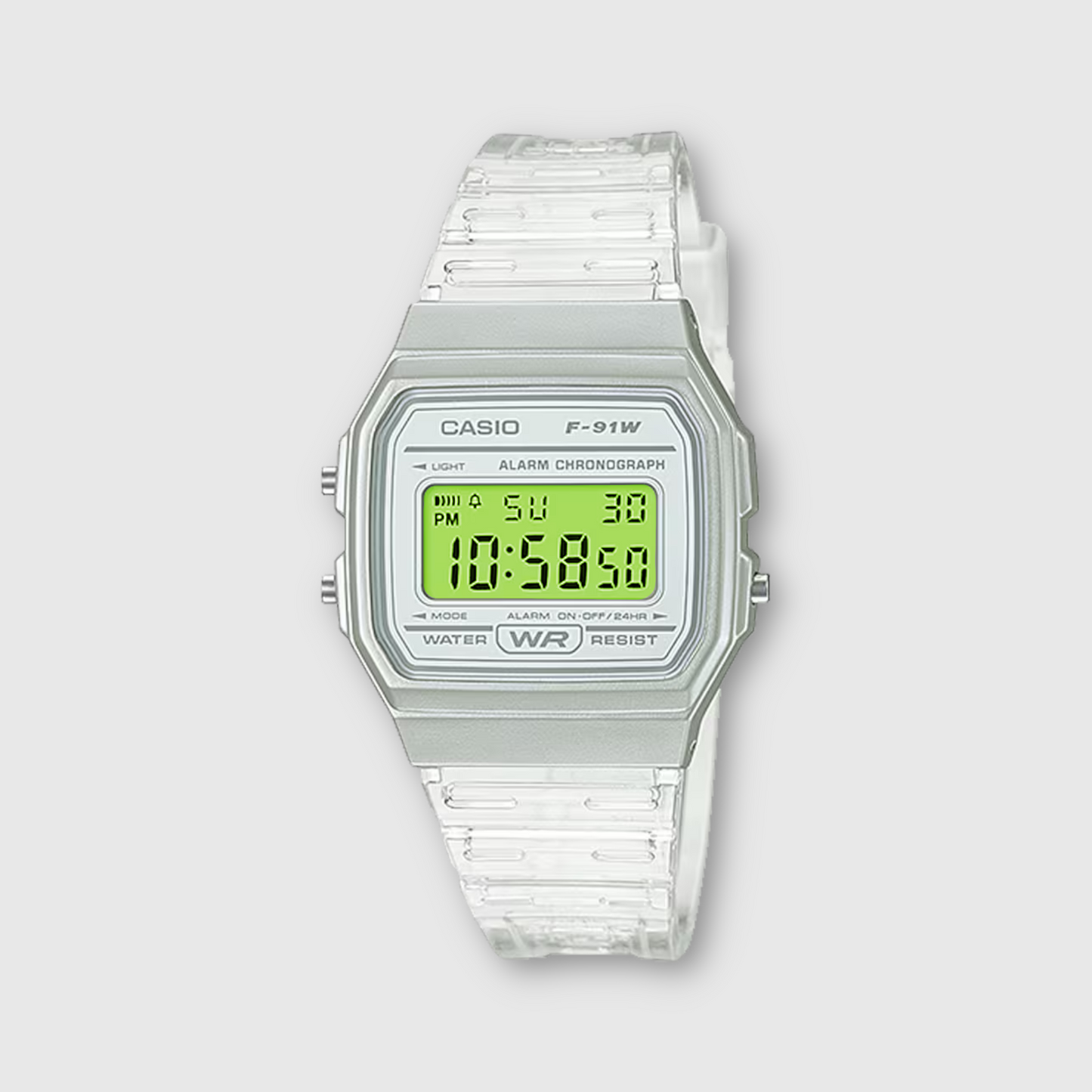 Casio digital watch with a clear strap on a light gray background
