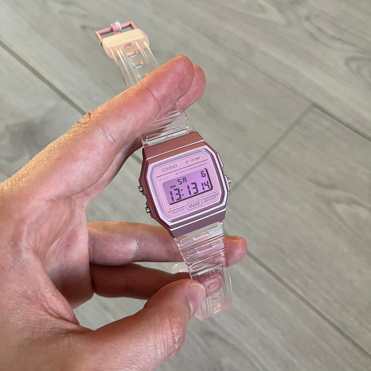Custom Casio F-91W Pink digital watch featuring a fully Pink filter screen. Slim 8.5 mm profile, lightweight 21 g build and flexible bio-based resin band ensure lasting comfort. Includes alarm, stopwatch, and microlight function for everyday functionality.