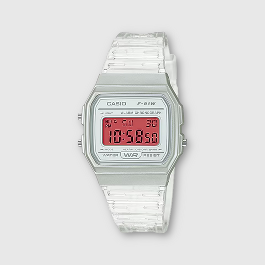 Casio digital watch with clear strap on a light gray background