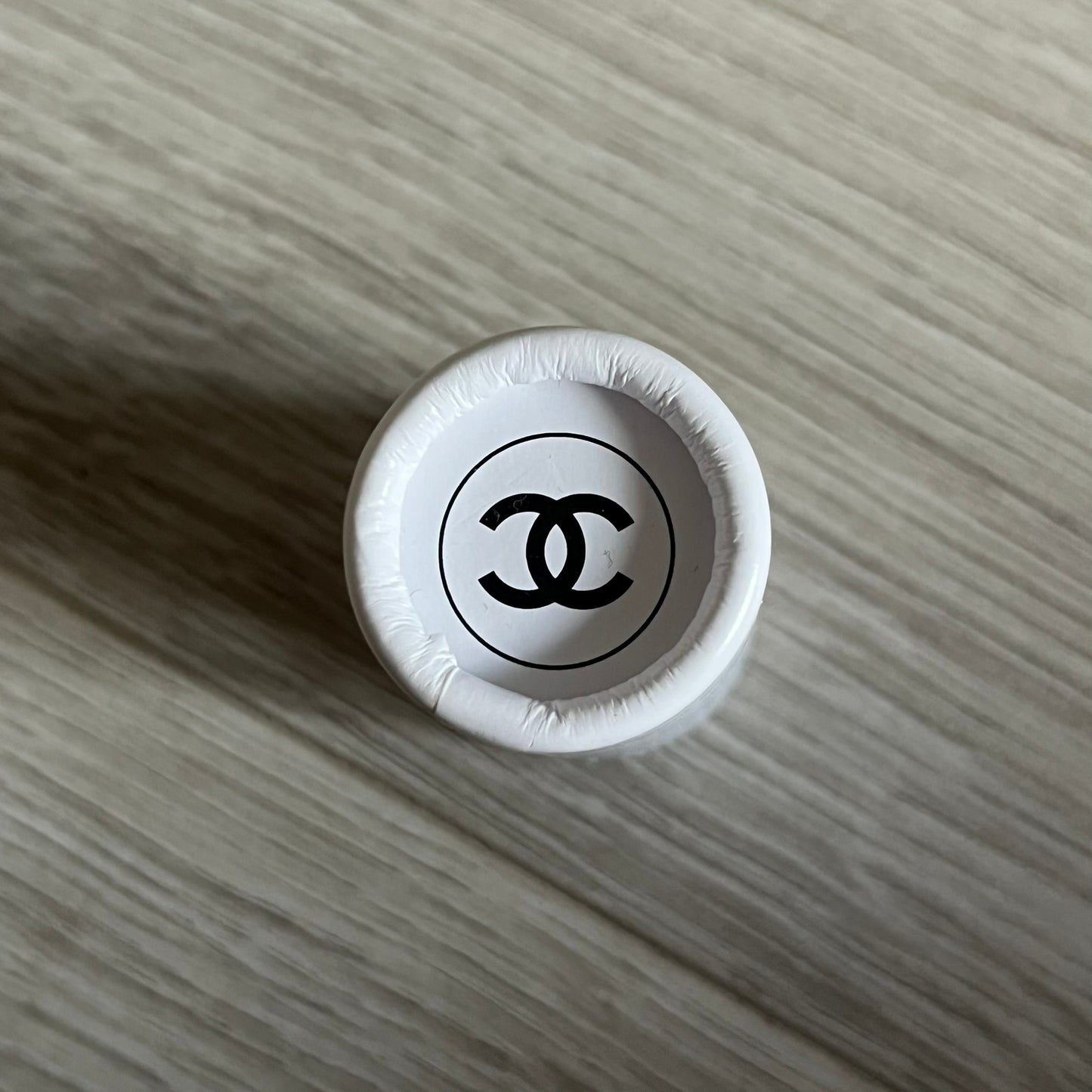 Chanel Mother’s Day Colored Pencils Set from 2021, presented in a white cylindrical tube with “Happy Mother’s Day” text and the Chanel logo on top. A Chanel Beauté complimentary gift featuring six branded colored pencils in blue, red, yellow, brown, orange, and green.