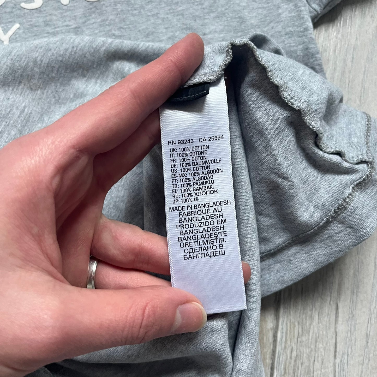 Diesel Music 1978 Gray Tee is a gray T-shirt featuring a large hand-drawn style “Diesel Music 1978” print on the front with additional text below. Made from 100% cotton, it has a crew neckline and short sleeves. The print is white, contrasting with the gray fabric.