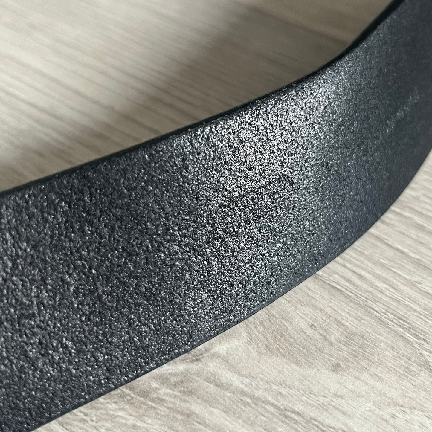 Dolce & Gabbana "Made with Pride" Belt crafted from smooth black Italian leather. Features a circular silver buckle with D&G 94 at the center, surrounded by “Proud to Wear D&G,” “Made with Pride,” and “Established 1994” text. Finished with subtle red and navy accents, combining classic craftsmanship with contemporary flair.