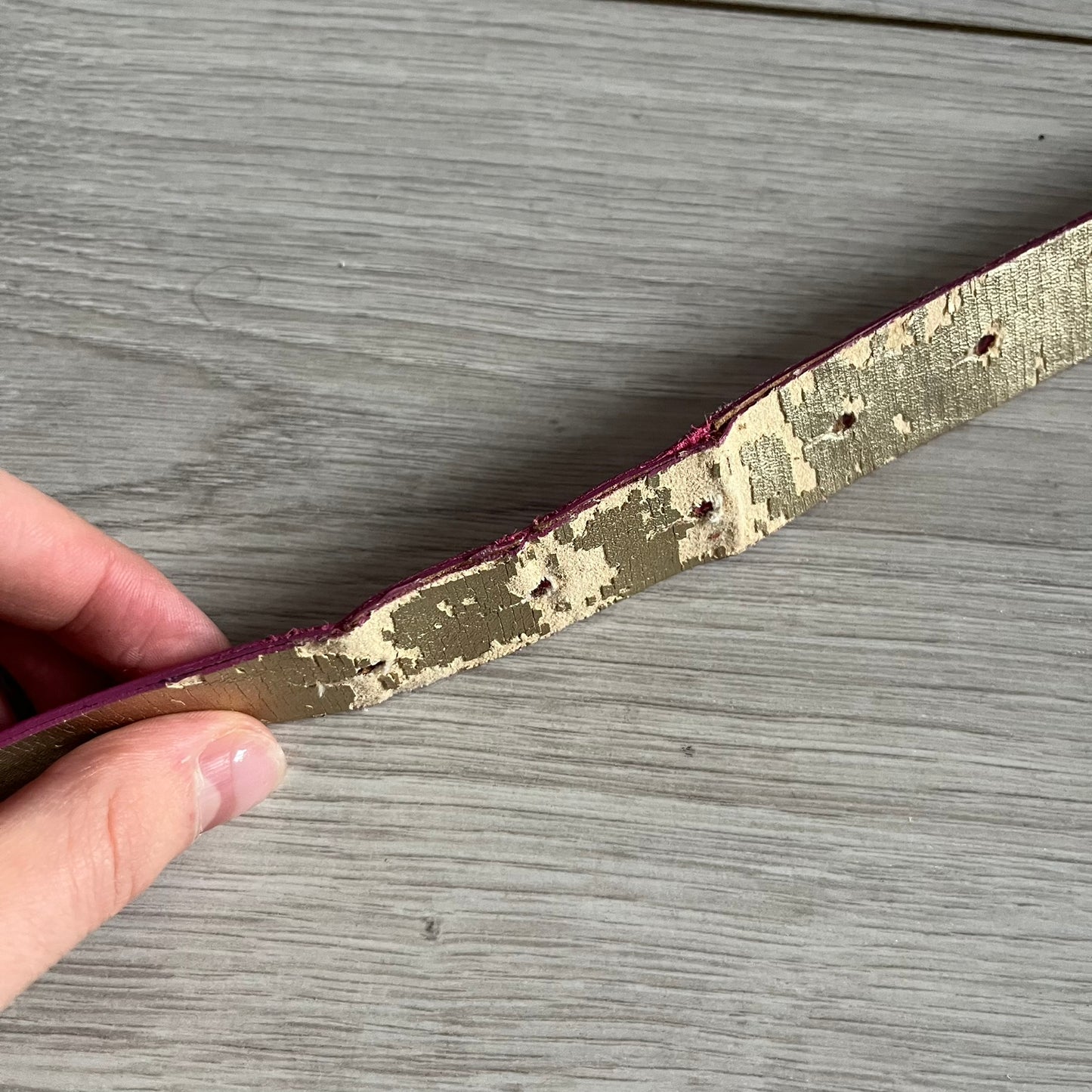 This Dolce & Gabbana Belt combines a slim pink design with a statement D&G buckle framed in gold and accented by visible screws. The inner side of the belt features a gold finish, highlighting the brand’s attention to material contrast. A classic Italian accessory crafted with detailed hardware.