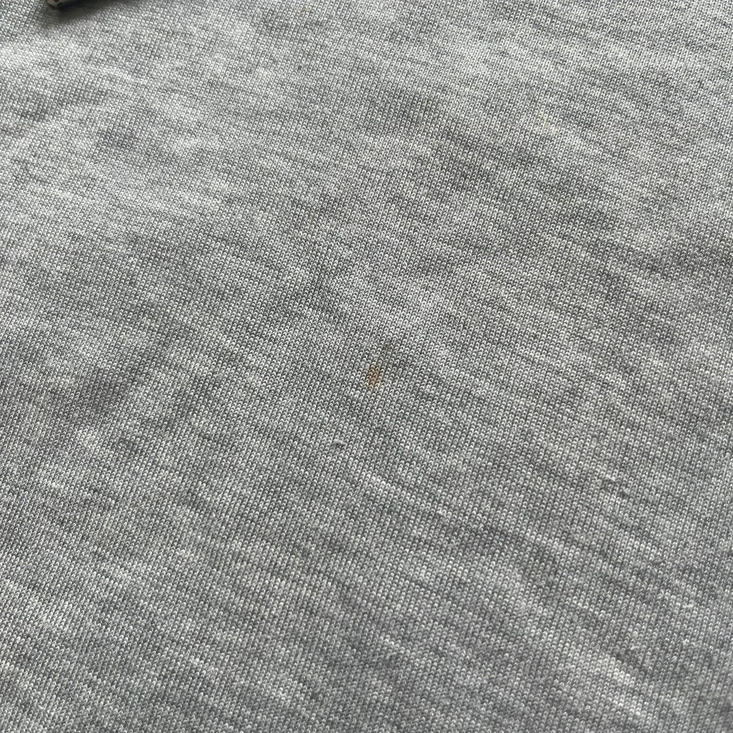 Gucci Gray Crest Patch Sherry Line Zip-Up Hoodie is a lightweight gray zip hoodie made in Italy. The chest features a crest patch with Gucci logo, while the bottom hem includes the green and red Web (Sherry Line) detail. The drawstrings have metal aglets engraved with Gucci branding.