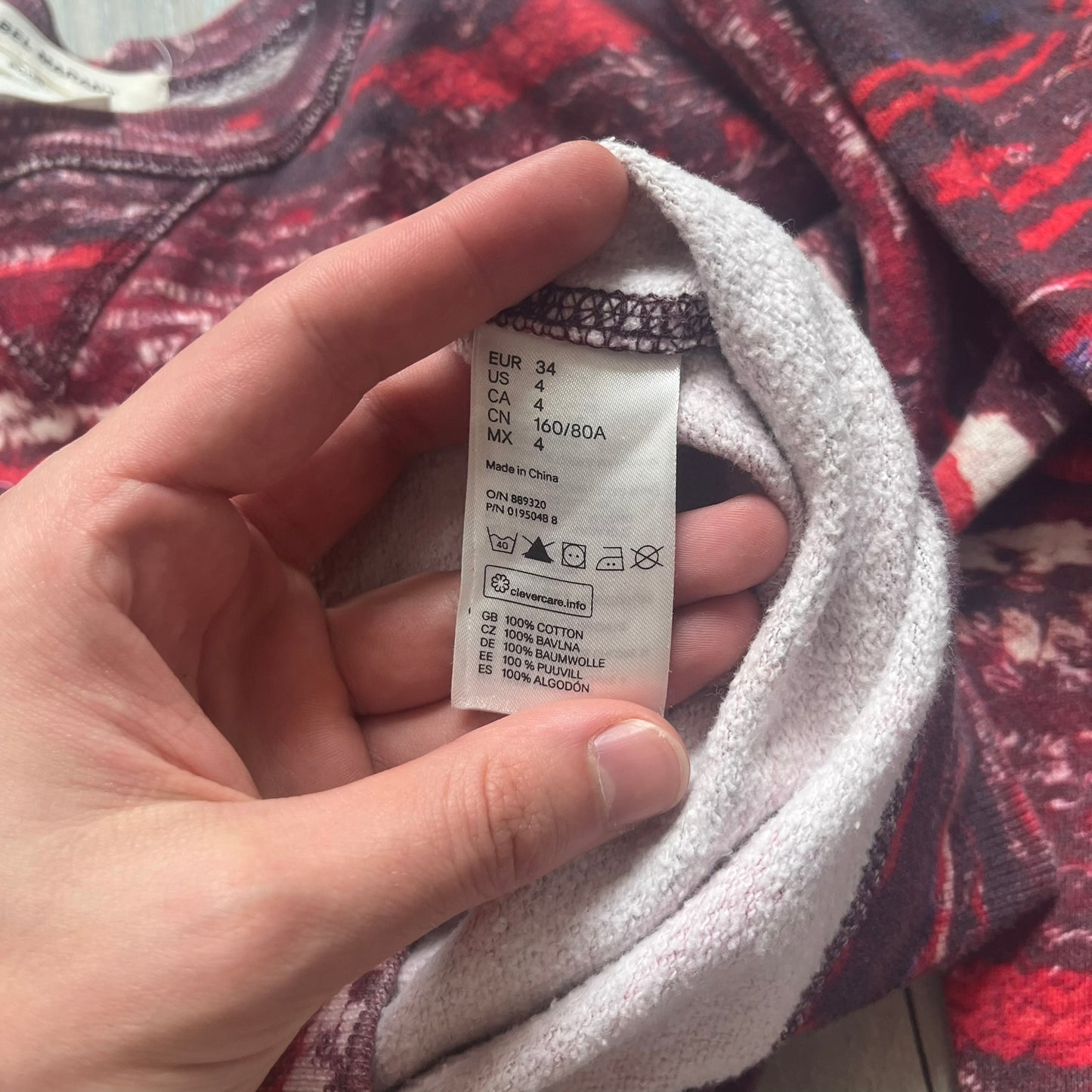 H&M x Isabel Marant 2013 Red Disorder Sweater is a women’s knit sweater in red, made from a soft fabric blend. The sweater features a deliberately distressed knit throughout, with ribbed cuffs and hem for structure. It was released as part of the H&M x Isabel Marant 2013 collaboration