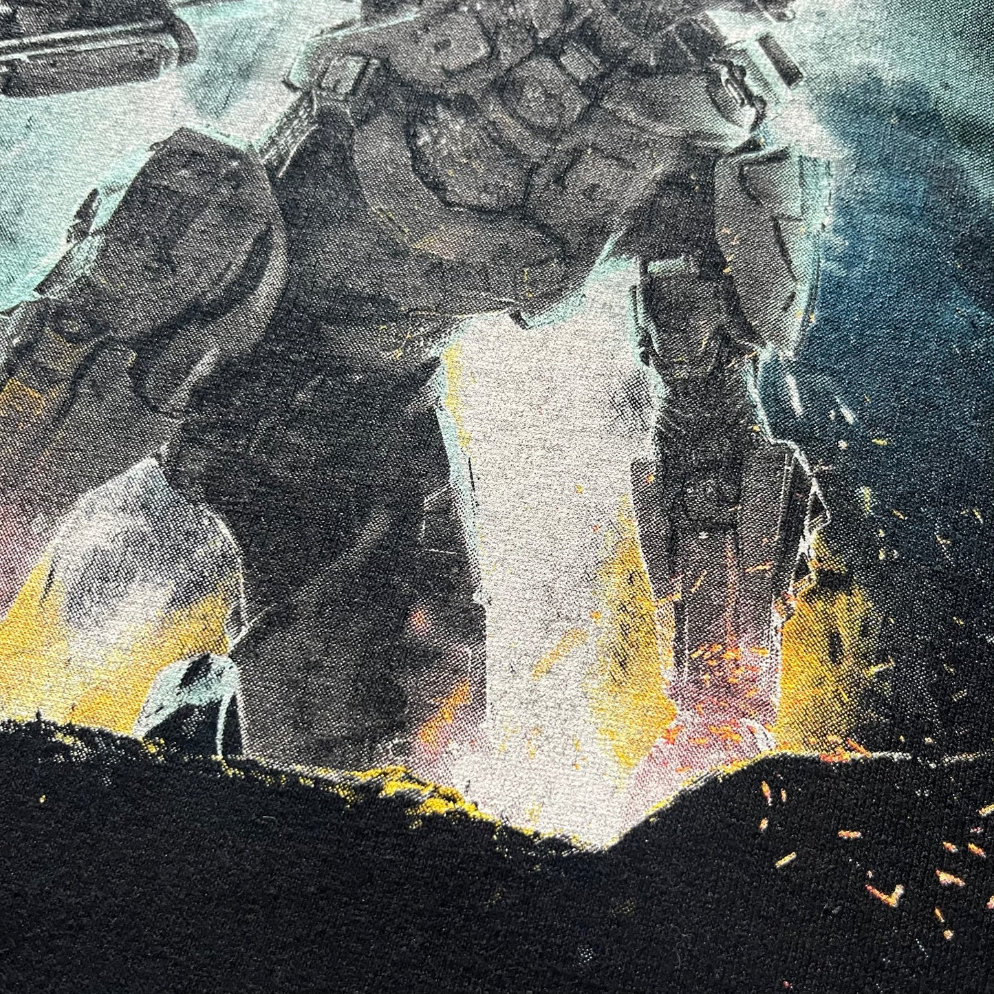 Halo 4 cover tee from 2012, printed on black Gildan heavy cotton. Features the iconic game cover artwork with Master Chief and beautiful Halo 4 text underneath. A collectible piece for Xbox and Halo fans.