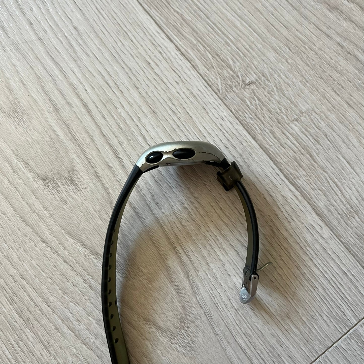 Metal stirrup on a wooden floor