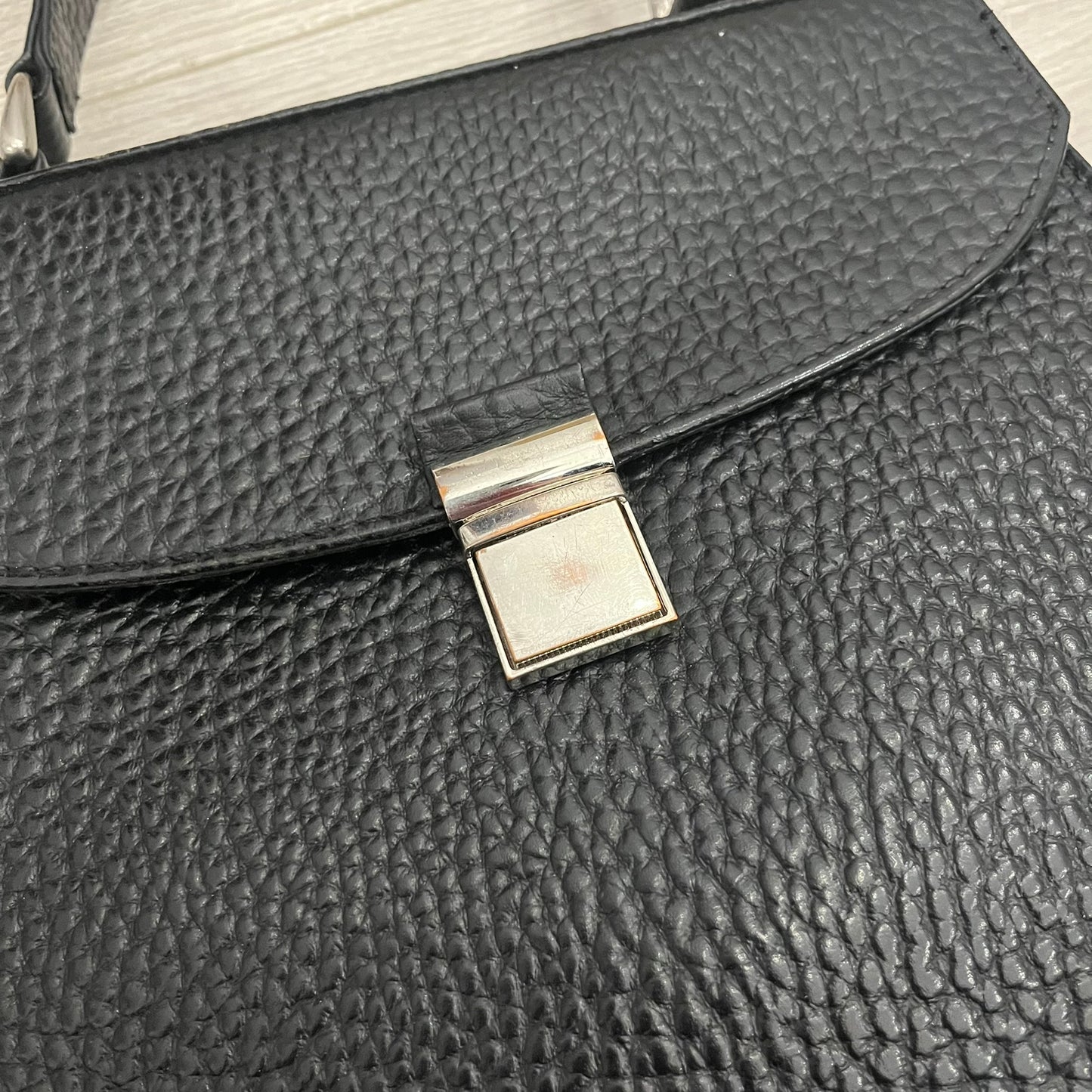 black leather handbag