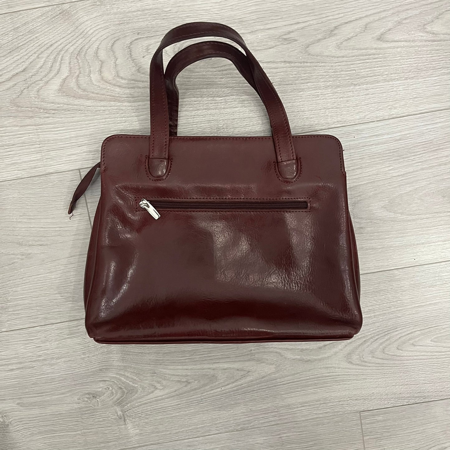 burgundy leather handbag