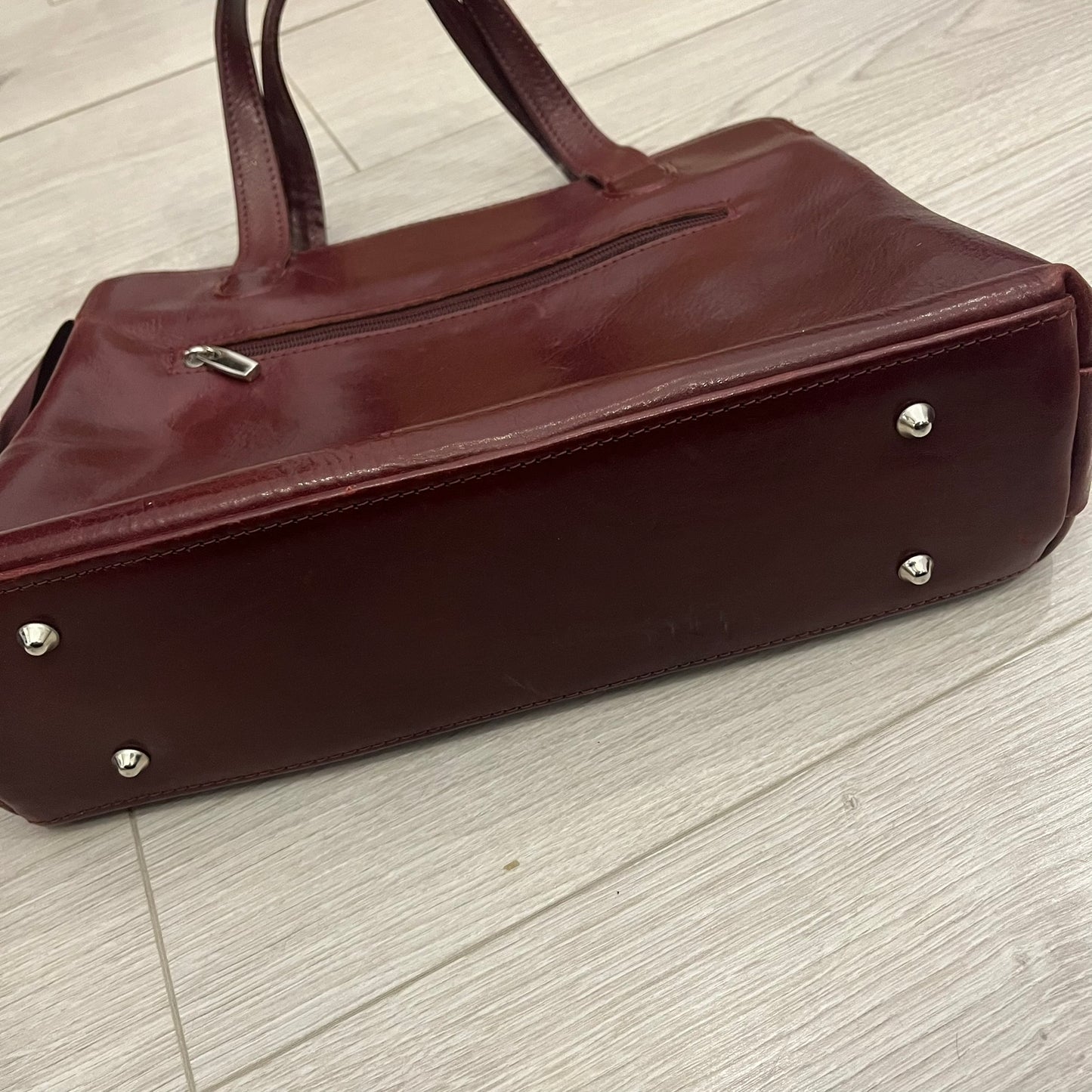 burgundy leather handbag