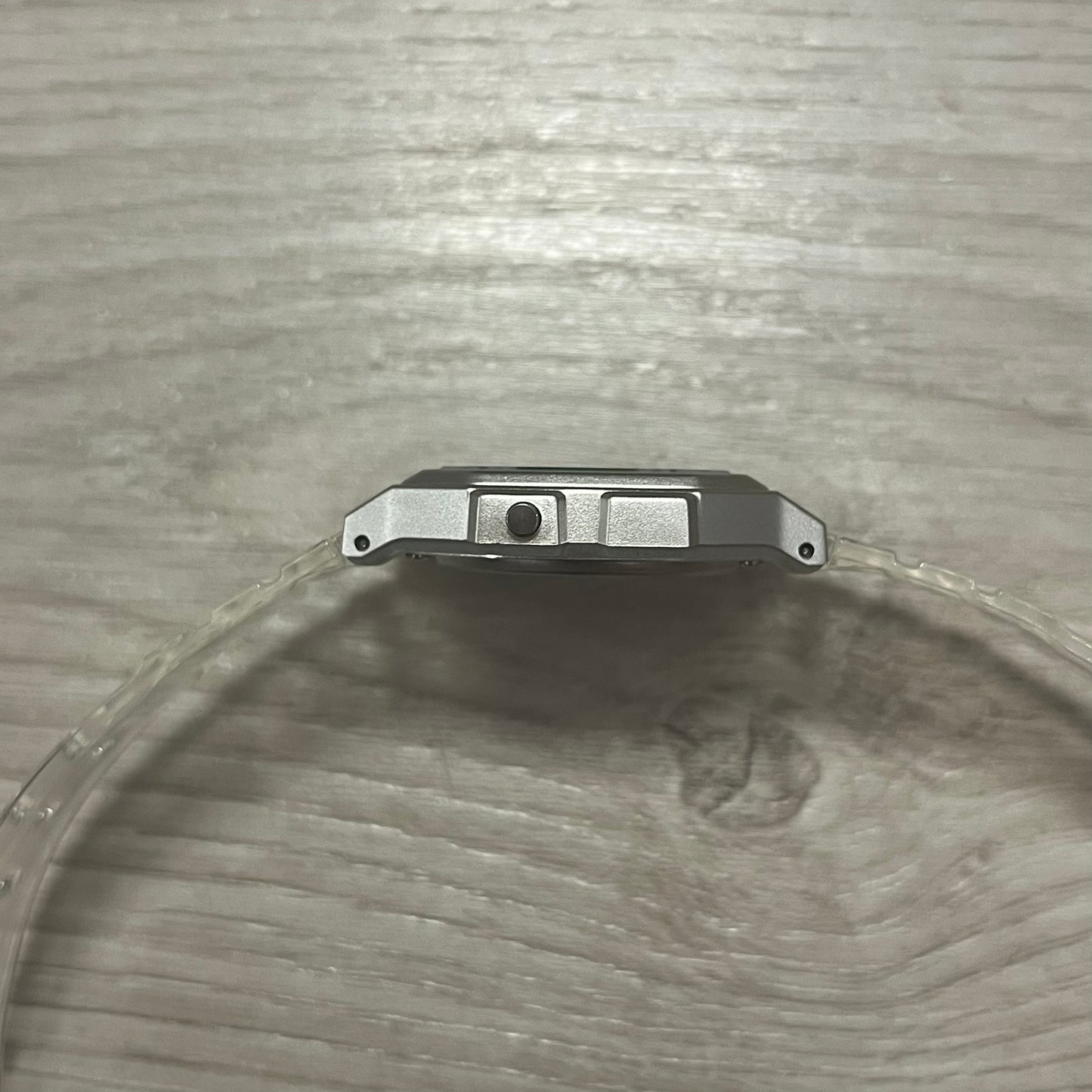 Metallic object on a textured glass surface