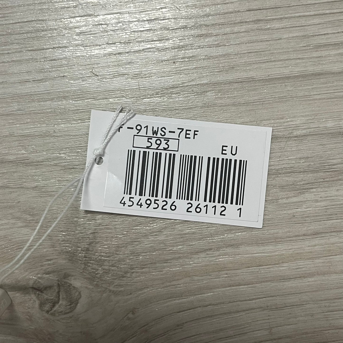 Bar code label on a wooden surface