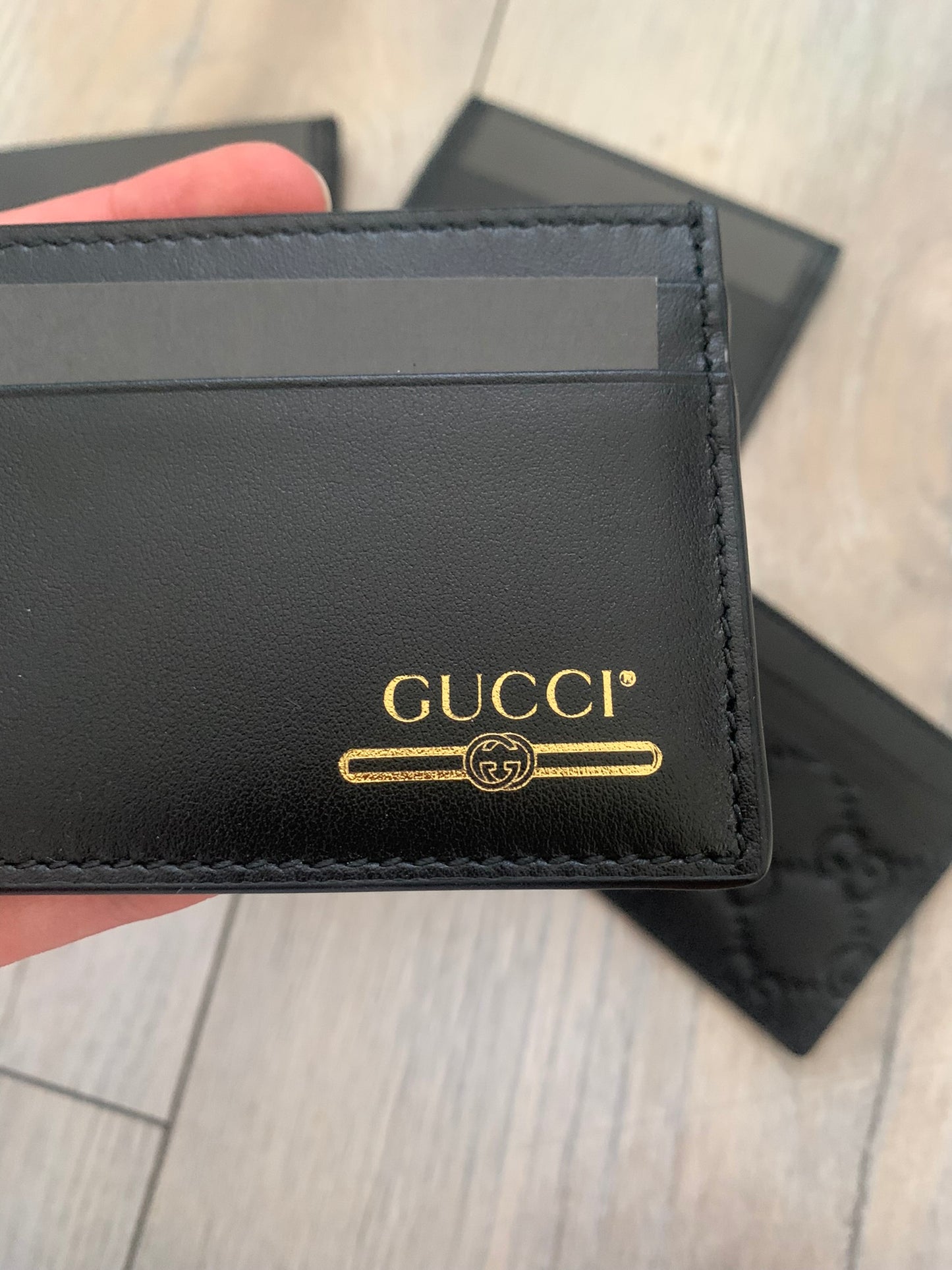 gucci gold logo cardholder
