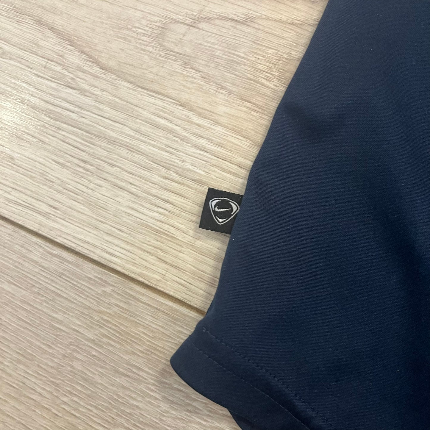 nike football logo tee