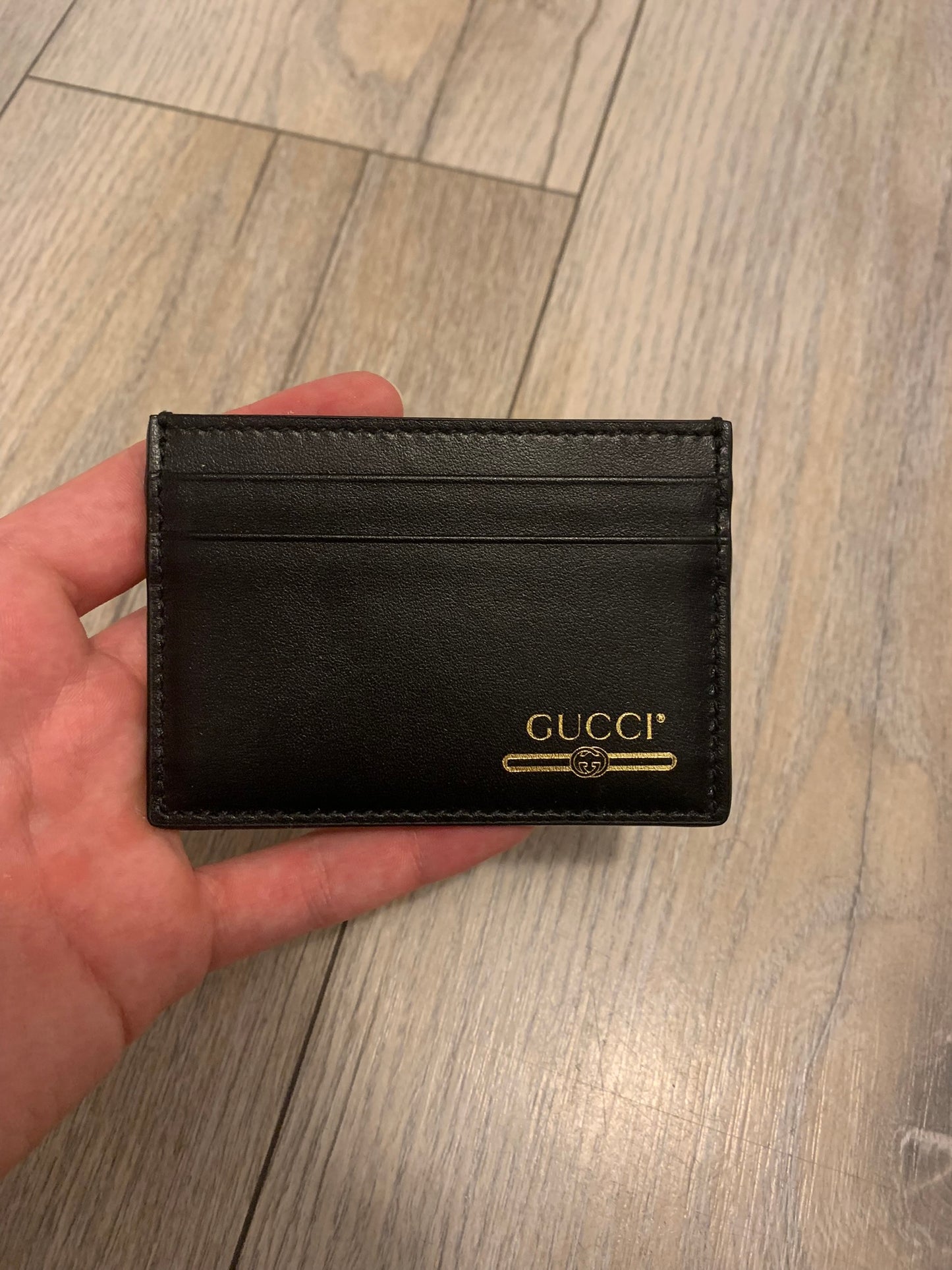 gucci gold logo cardholder