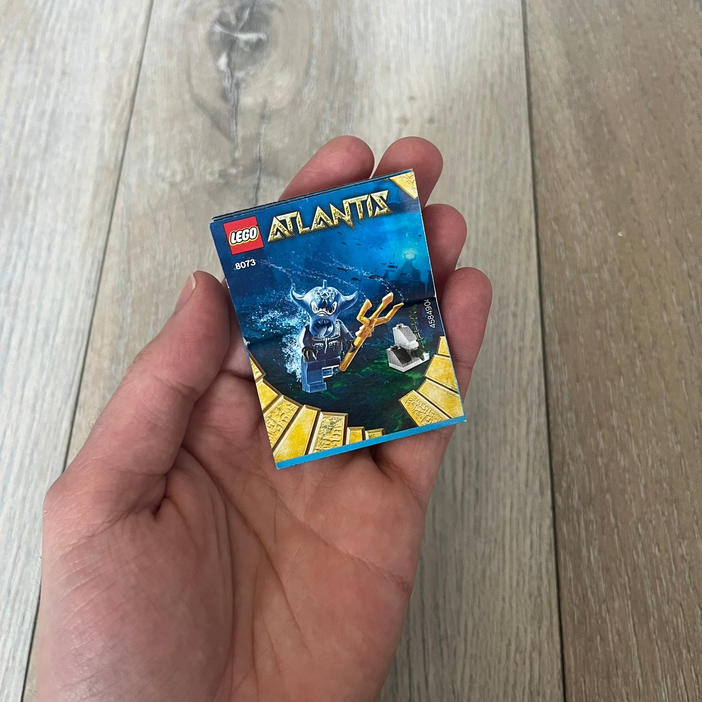 LEGO Atlantis 8073 Manta Warrior Set is a 2009 release consisting of 13 pieces. The set includes a Manta Warrior minifigure armed with a trident and a small seaweed-covered rock build. It was part of the Atlantis theme and released as a small impulse set.