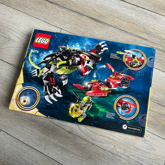 LEGO Atlantis 8079 Shadow Snapper Set is a 2010 release consisting of 246 pieces. The set includes a Shadow Snapper creature, a combat sub with dual flick-launching torpedoes and spinning propeller, a deep-sea diver minifigure (Lance Spears), a Monster Turtle, and an exclusive yellow Atlantis treasure key. The Shadow Snapper measures approximately 20 cm in length, while the sub measures around 12 cm.