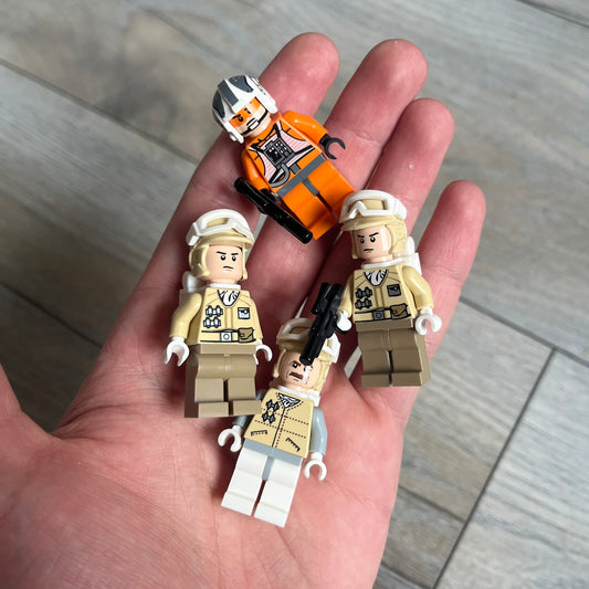 LEGO Star Wars 8083 Rebel Trooper Battle Pack Set is a 2009 release containing 79 pieces. The set includes four minifigures: Zev Senesca, a Hoth Officer, and two Rebel Soldiers in cold-weather Hoth gear, along with a Rebel combat speeder equipped with flick-firing missiles. It was designed to represent Rebel forces from Star Wars: The Empire Strikes Back.