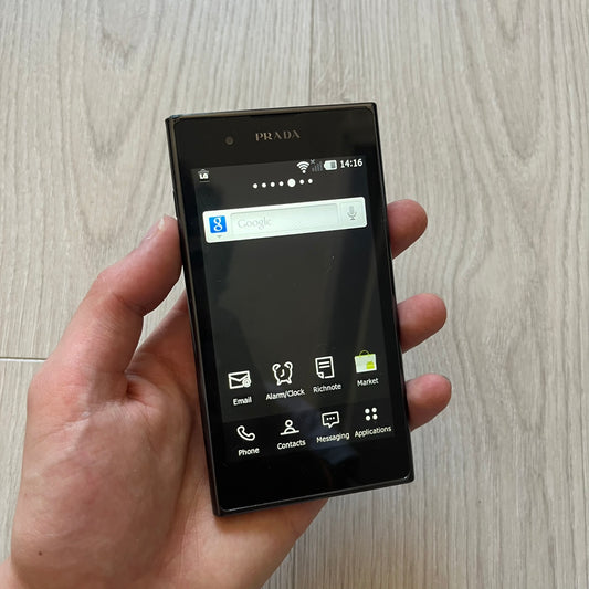 LG Prada 3.0 P940 smartphone full set with box, case, earphones, and original papers. Known for its premium Prada-branded design, the phone runs Android, boasts an 8MP rear camera, and a sharp, sleek look. A unique piece of tech fashion history.
