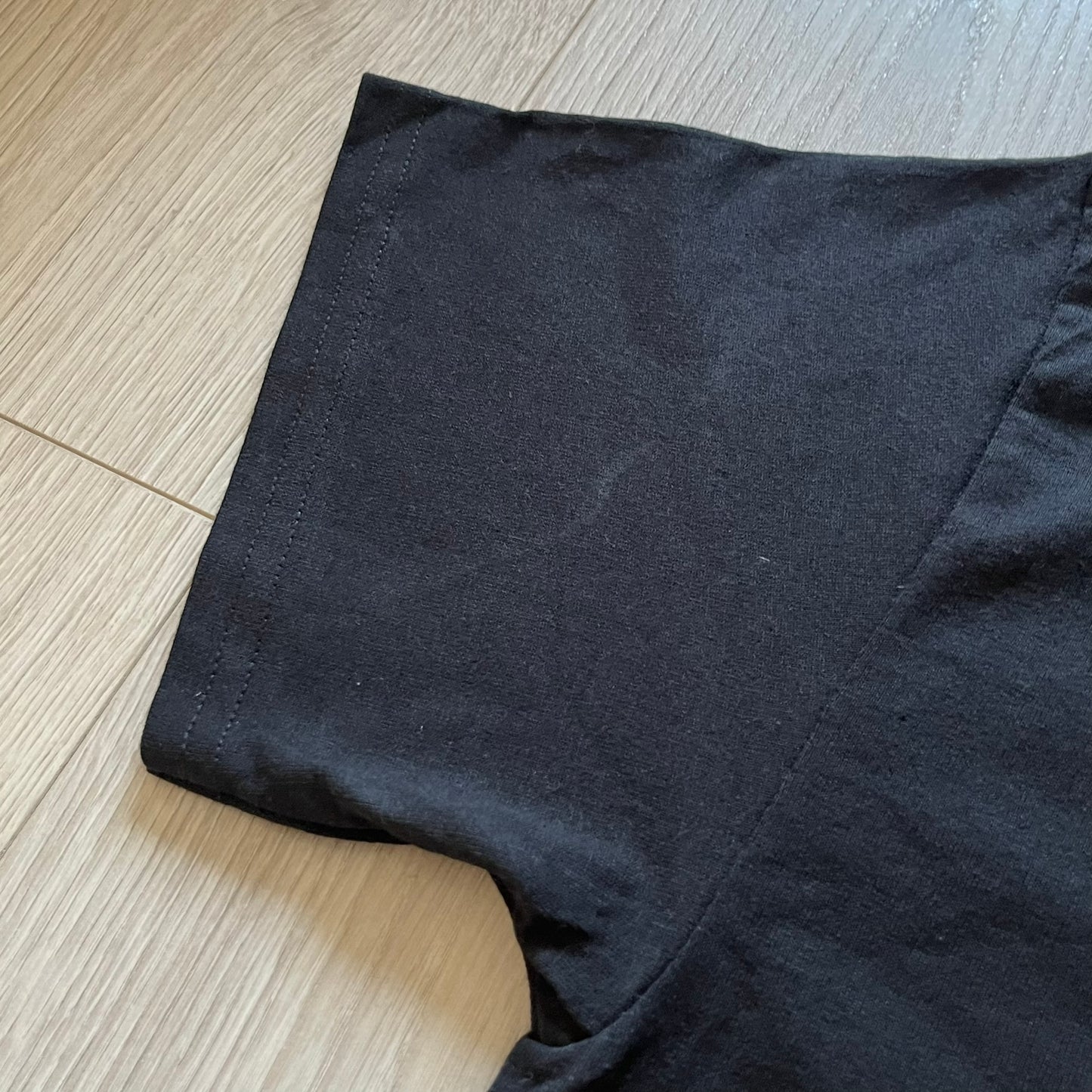 Black fabric on a wooden floor