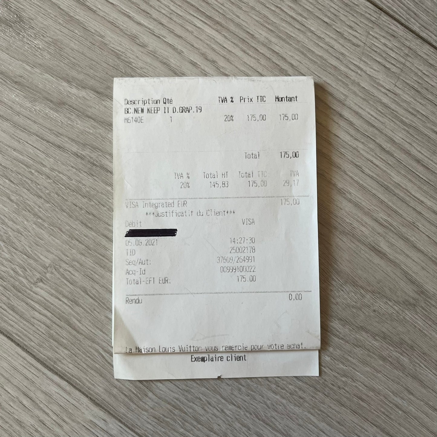 Receipt on a wooden surface