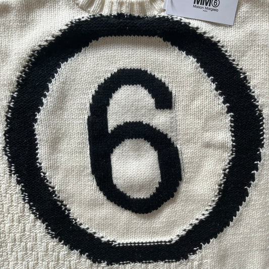 Black number '6' on a white background with a brand tag in the corner.