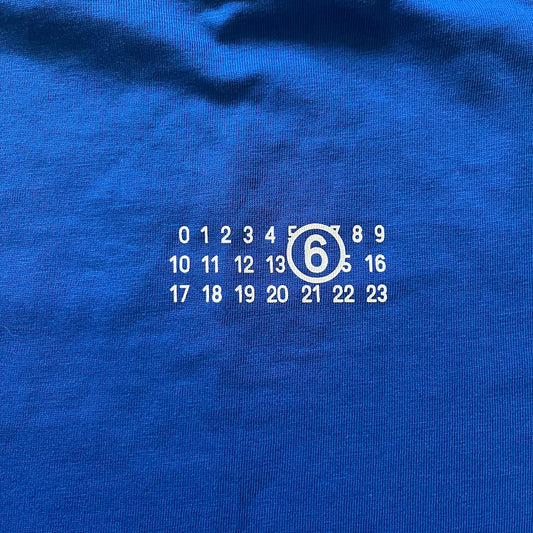 Blue fabric with white text and numbers printed on it