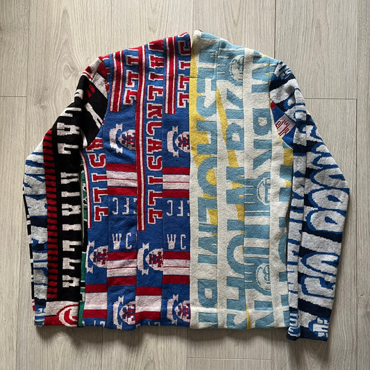 Folded multicolored patterned fabric on a wooden floor