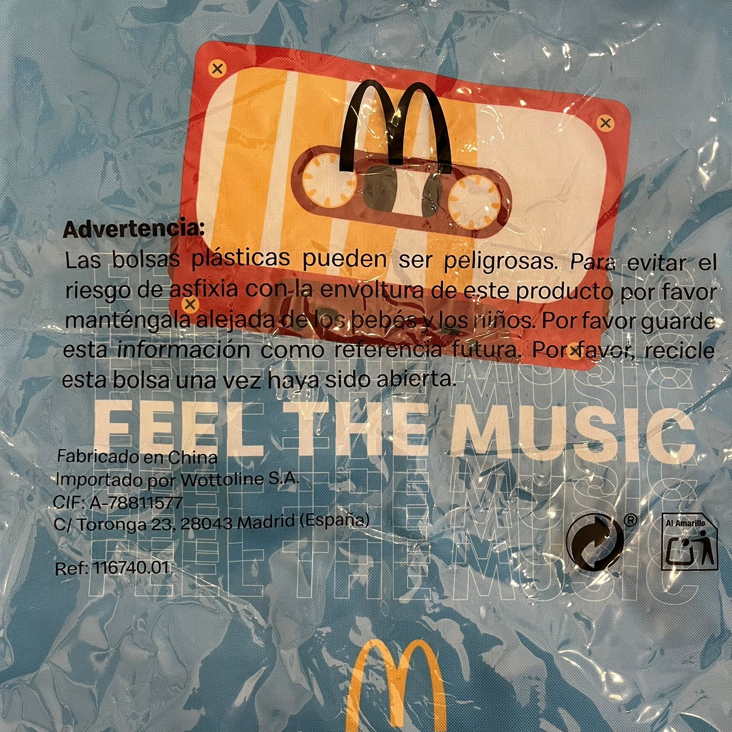 The McDonald’s Spain “Feel The Music” Backpack comes in a blue and yellow colorway with a vintage cassette graphic on the front. Constructed from lightweight non-woven synthetic fabric, it includes yellow straps and a zip-top closure. A collectible promotional item released by McDonald’s Spain.