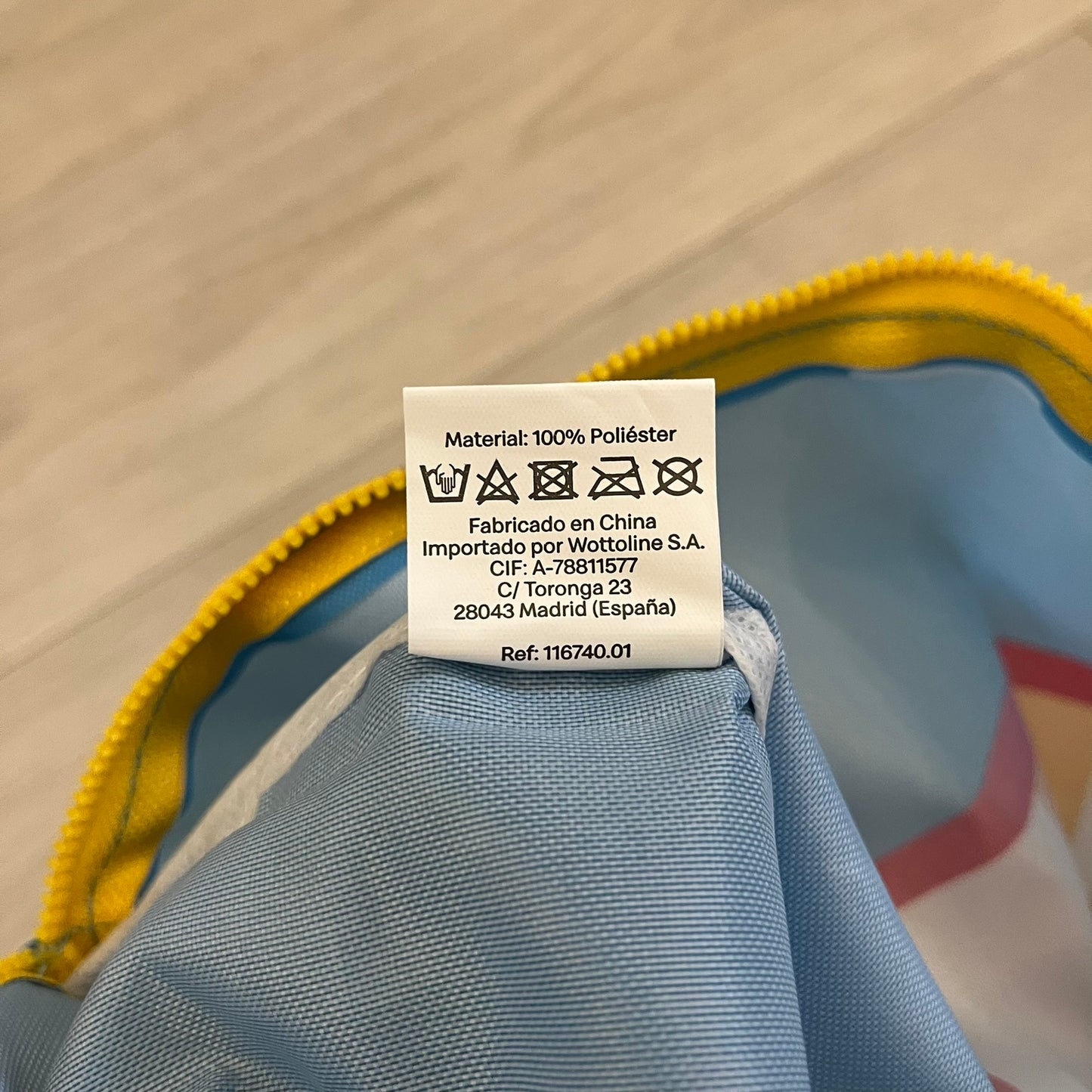 The McDonald’s Spain “Feel The Music” Backpack comes in a blue and yellow colorway with a vintage cassette graphic on the front. Constructed from lightweight non-woven synthetic fabric, it includes yellow straps and a zip-top closure. A collectible promotional item released by McDonald’s Spain.