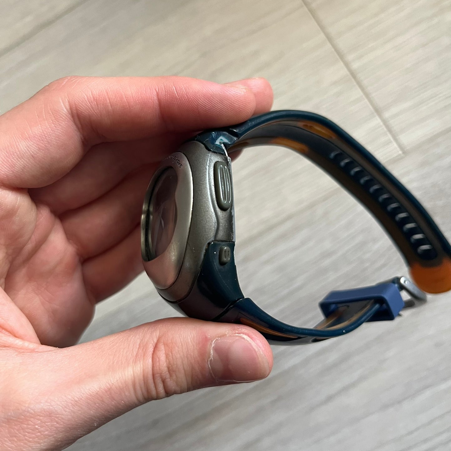 Nike Sports Chrono Cross Training Watch (WX0015) featuring a unique ana-digi “Covert” design with a partial hood over the analog dial. The display combines a three-hand analog setup with a curved dual-section LCD showing time, day, and mode. Water-resistant up to 50m and equipped with chronograph, timer, alarm, and dual-time functions, this model reflects Nike’s peak era of performance-driven digital innovation.