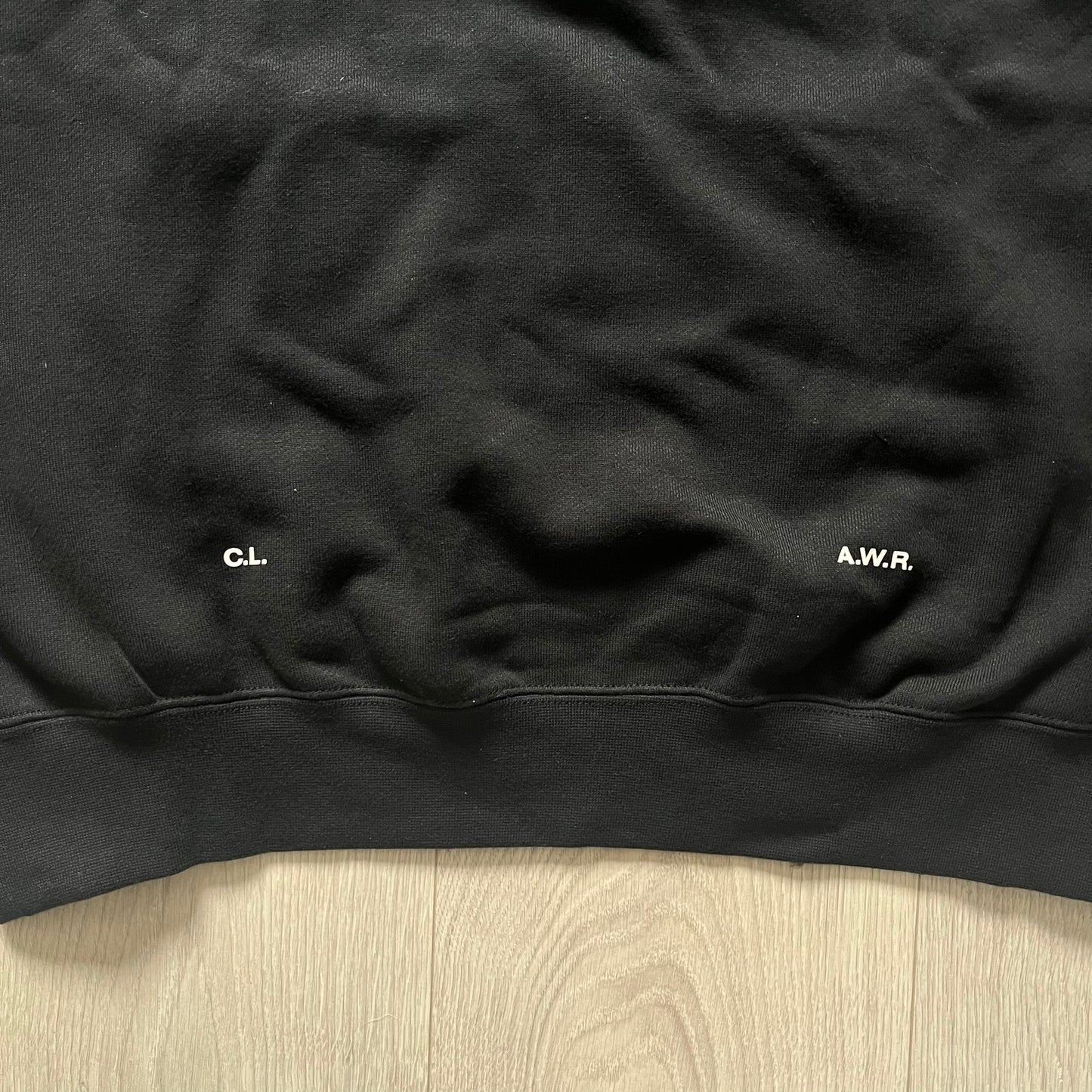 Nike x Nocta Fleece CS Hoodie in Black combines Drake’s refined streetwear vision with Nike’s premium craftsmanship. Made from an ultra-soft fleece blend, it features reflective piping, a silicone Swoosh logo and discreet NOCTA branding. With an adjustable hood, kangaroo pocket, and hidden zip pocket, this piece balances luxury comfort and technical precision.