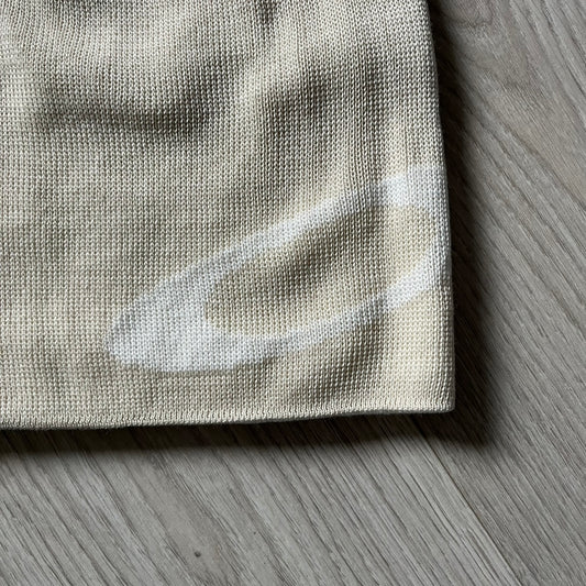The Oakley Side Ellipse Beige Beanie is made from soft 100% acrylic and features a white tilted O ellipse logo on the side. Designed with a reversible construction for versatile use in changing conditions. A practical and understated piece from Oakley’s performance headwear line.