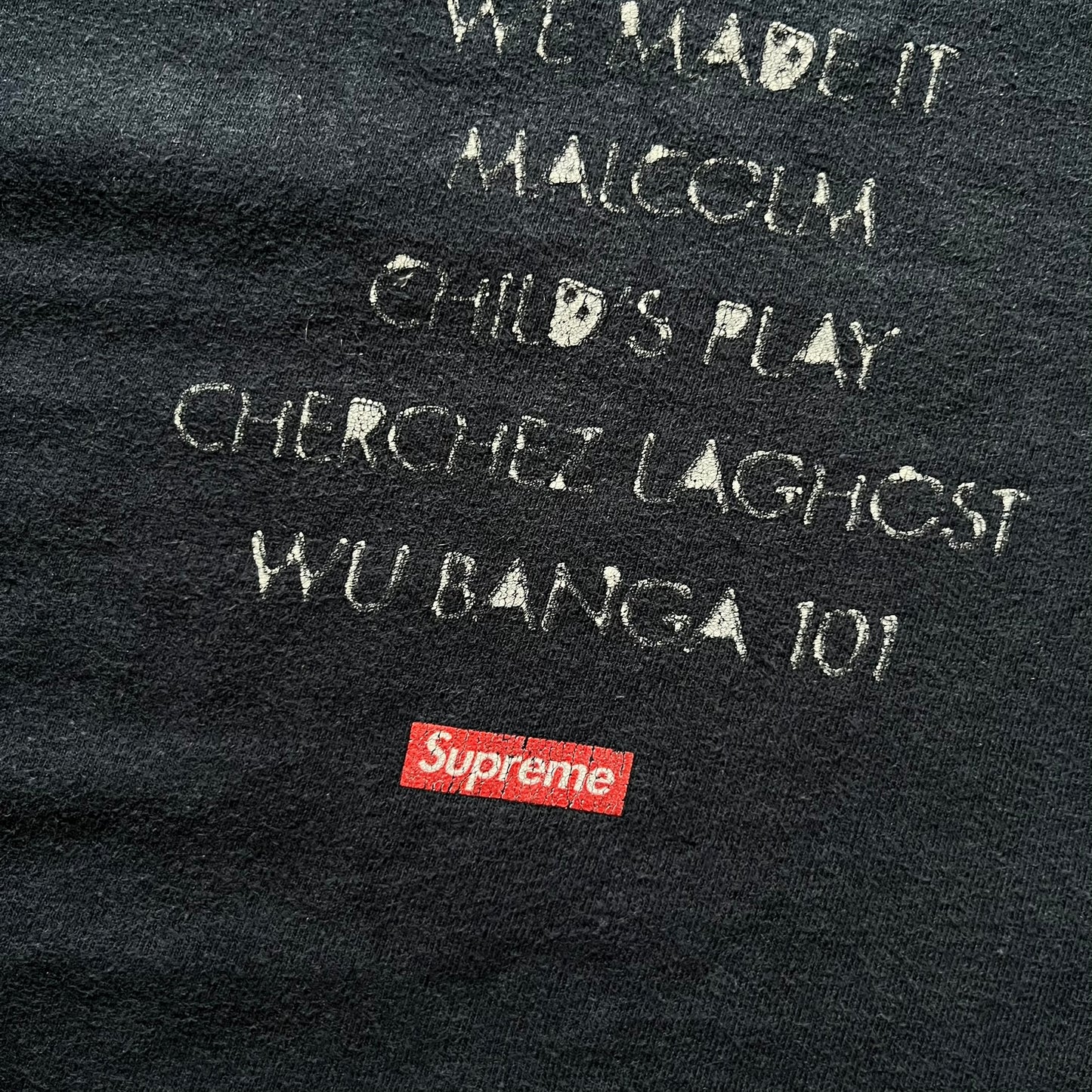 Supreme Clientele FW20 Navy Tee released in October 2020 as part of Supreme’s Fall/Winter 2020 collection. This cotton tee pays tribute to Ghostface Killah’s 2000 album Supreme Clientele, featuring the album’s iconic title graphic on the front and full tracklist on the back. A standout Supreme graphic tee that merges streetwear with hip-hop history.