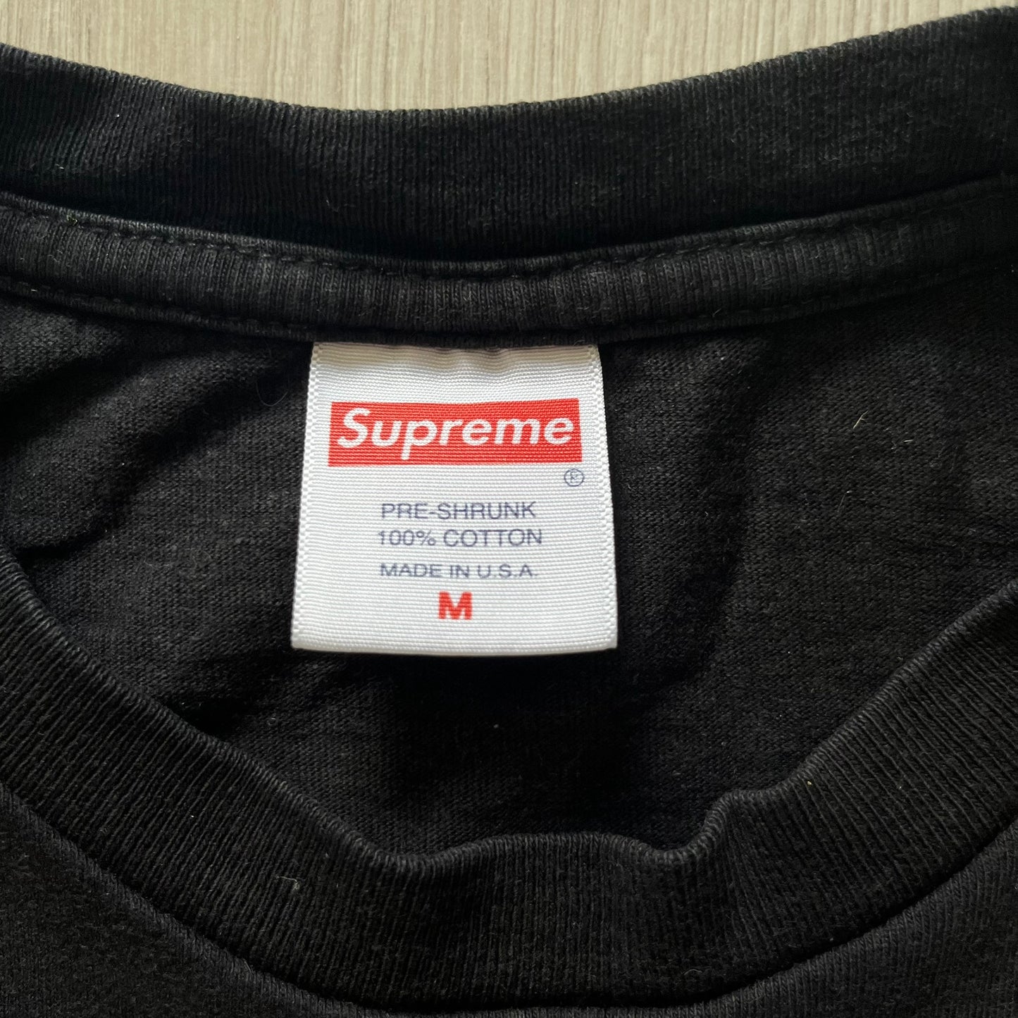 Supreme Fronts SS19 Black Tee released on February 21, 2019, as part of the brand’s Spring/Summer 2019 collection. Crafted from 100% cotton, it features a gold grill design with diamond fangs and a jeweled Supreme logo across the teeth. A standout graphic tee from Supreme’s early SS19 lineup.
