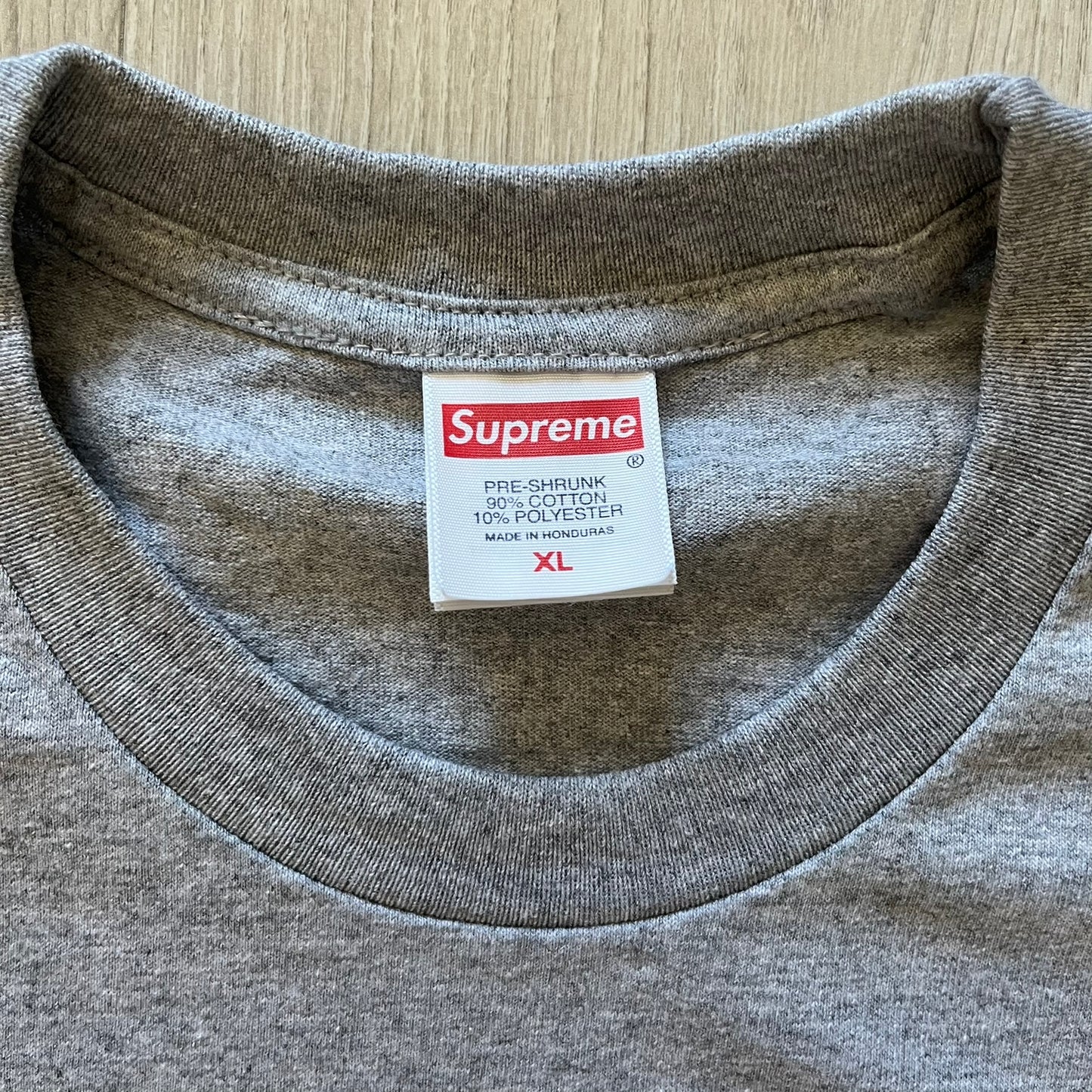 Supreme Playboi Carti photo tee in Heather Gray from the FW25 collection, featuring a large front print of the influential rapper. Crafted from soft cotton, it merges Supreme’s iconic photo tee format with Carti’s distinct cultural presence.