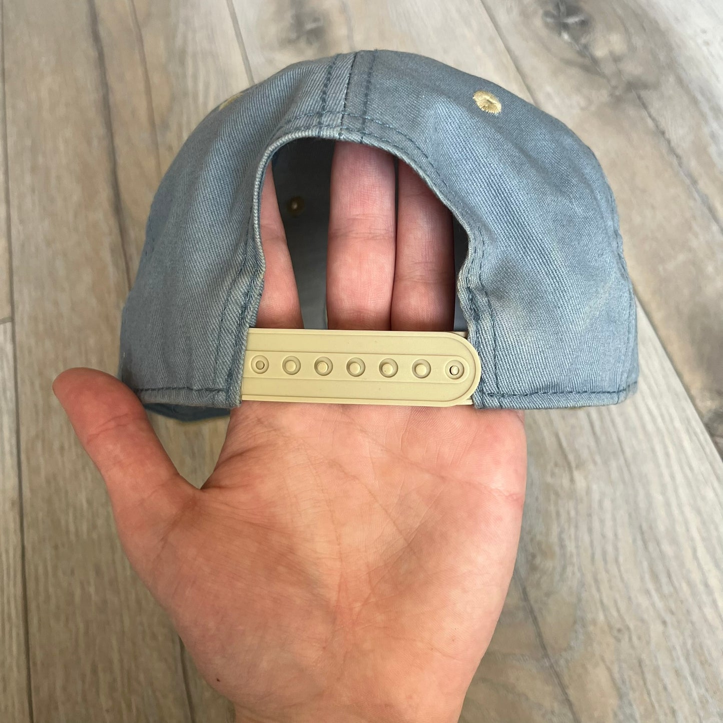 Team Fortress 2 Scout BLU LootCrate Hat is a blue and beige/yellow cap released with the 2016 LootCrate. The blue crown features an embroidered BLU Team Scout Hermes Boot logo, while the beige/yellow visor includes a BLU Team sticker and a large Team Fortress 2 logo on the underside. The hat combines official game branding with collectible LootCrate exclusivity.