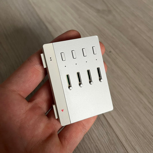 Teenage Engineering YZY 2019 OG Stem Player, an unreleased collaboration between Kanye West and Teenage Engineering. This rare device allows you to isolate stems like vocals, drums, and bass while adding effects such as filters, echo, and distortion. Featuring a sleek, minimalist metal design and ergonomic build, it was first seen during Kanye’s 2019 Sunday Service era and came paired with exclusive extended versions of “Jesus Is King.” Fully compatible with headphones and speakers, it remains a sought-afte